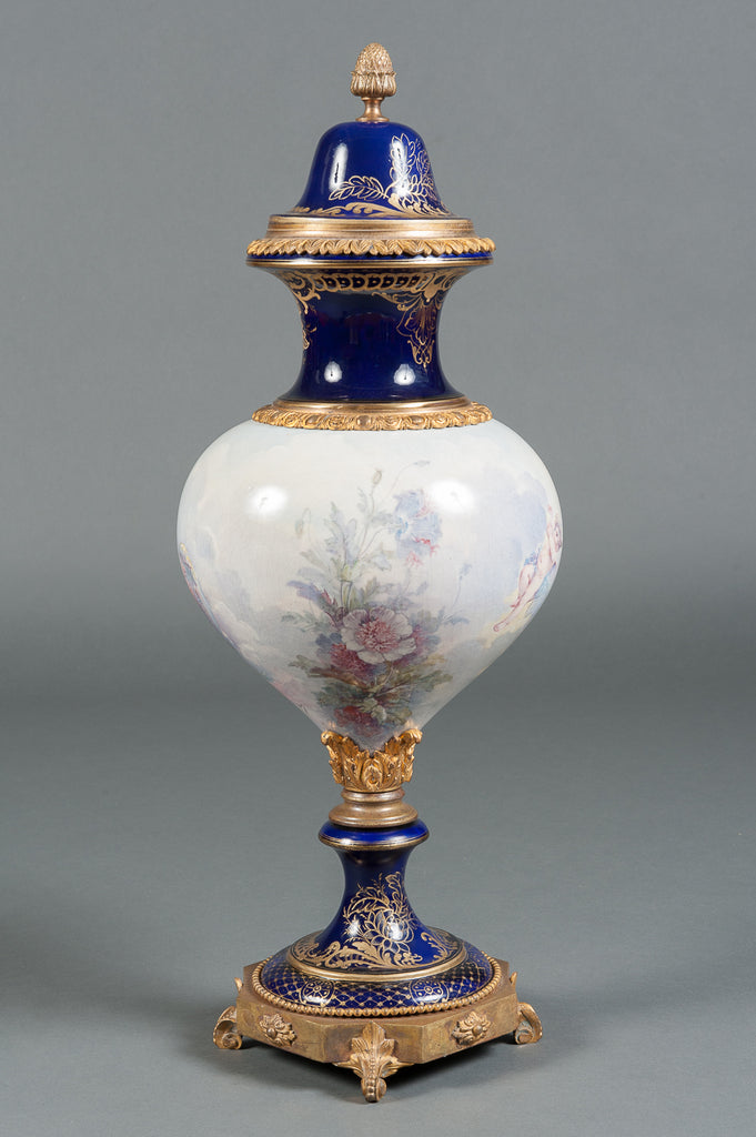 A FRENCH SEVRES STYLE PORCELAIN PAINTED VASE AND COVER, 19TH CENTURY