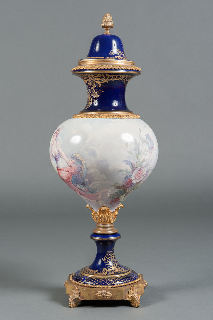 A FRENCH SEVRES STYLE PORCELAIN PAINTED VASE AND COVER, 19TH CENTURY